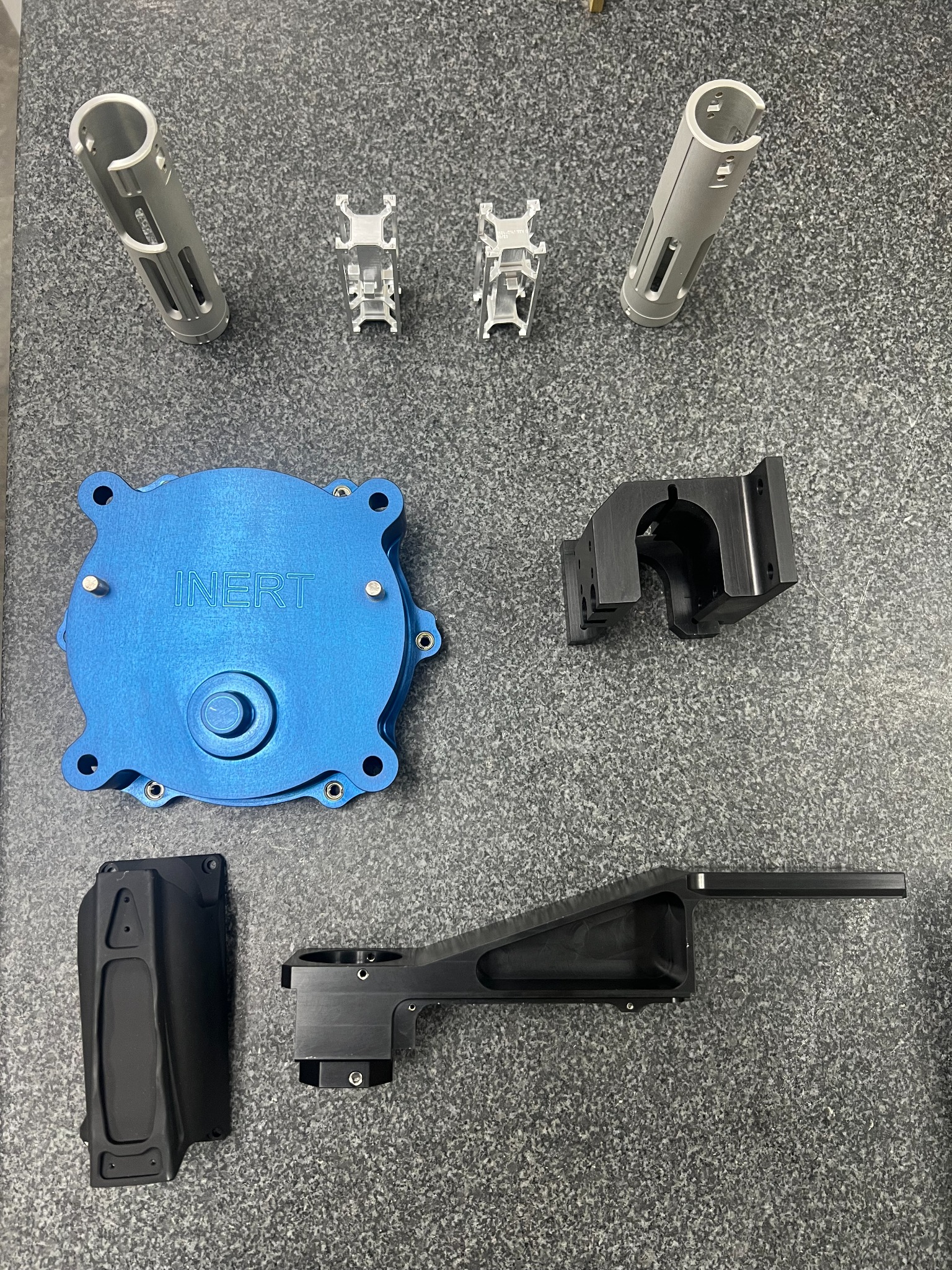 Set of precision machined and finished components